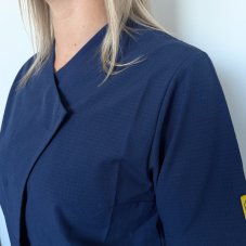 Neckline and crossover front of the ESD PLUS unisex coat